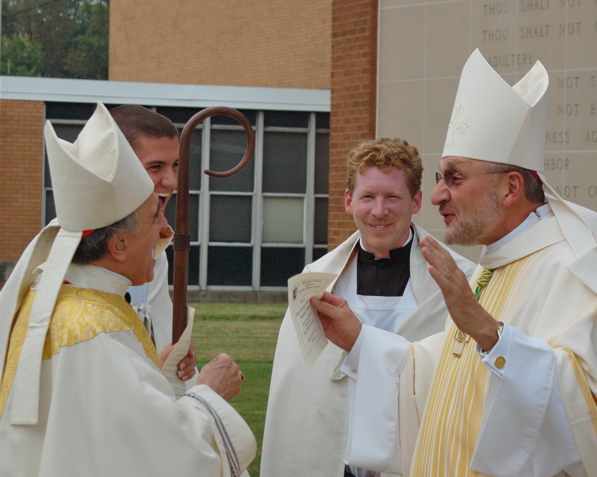 Cardinal DiNardo and Bishop Zubik enjoying a story with the seminarians.